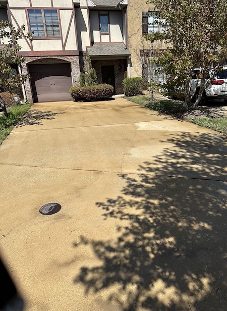 What is the best way to remove oil rust and tire marks from your driveway